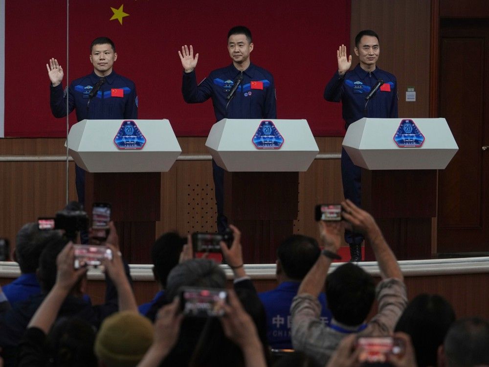 Chinese astronauts return to Earth after being stuck in space ...